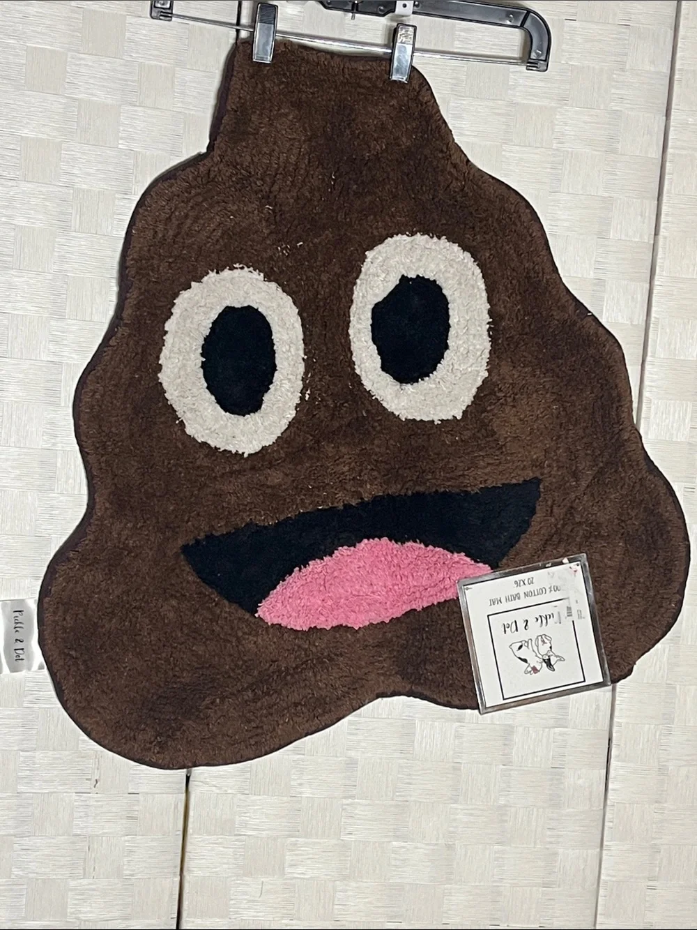Plush Brown Smiling Poop Emoji Bath Mat with Pink Tongue